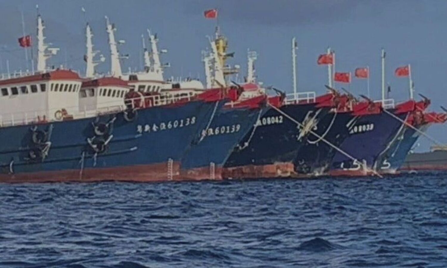 Philippines demands China remove vessels from 6 islands, reefs