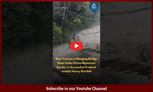 Man Crosses a Hanging Bridge in Arunachal Pradesh Amid Heavy Rainfall